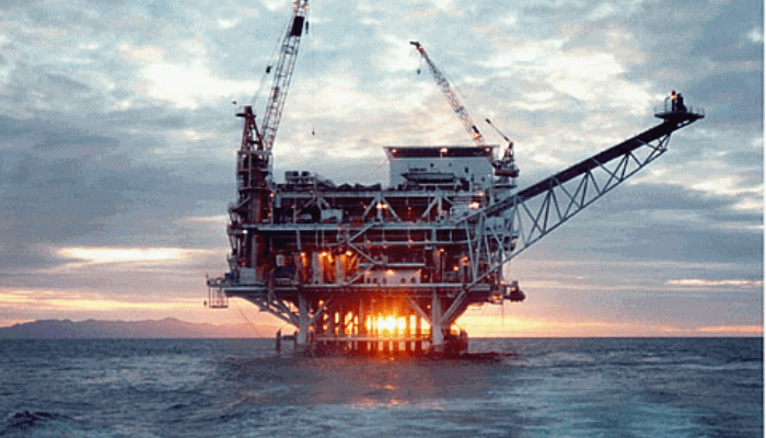 Offshore oil platform at dusk
