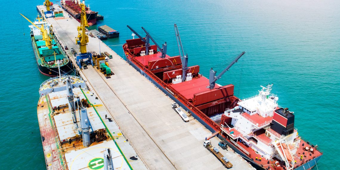 Crude oil tanker loading at terminal